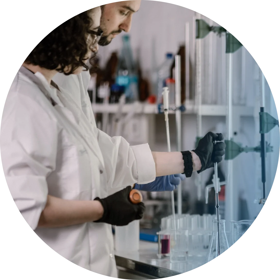Chemists working at a laboratory bench
